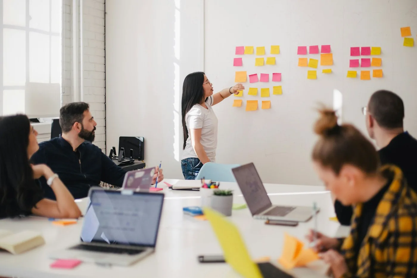 Professional project management team planning and coordinating work — representative service image